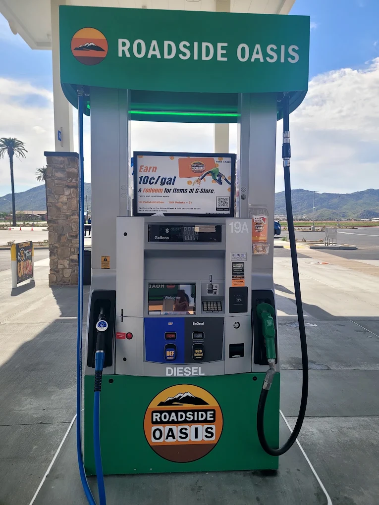 Roadside Oasis diesel pump showing the 10 points per gallon rewards offer in Menifee, CA